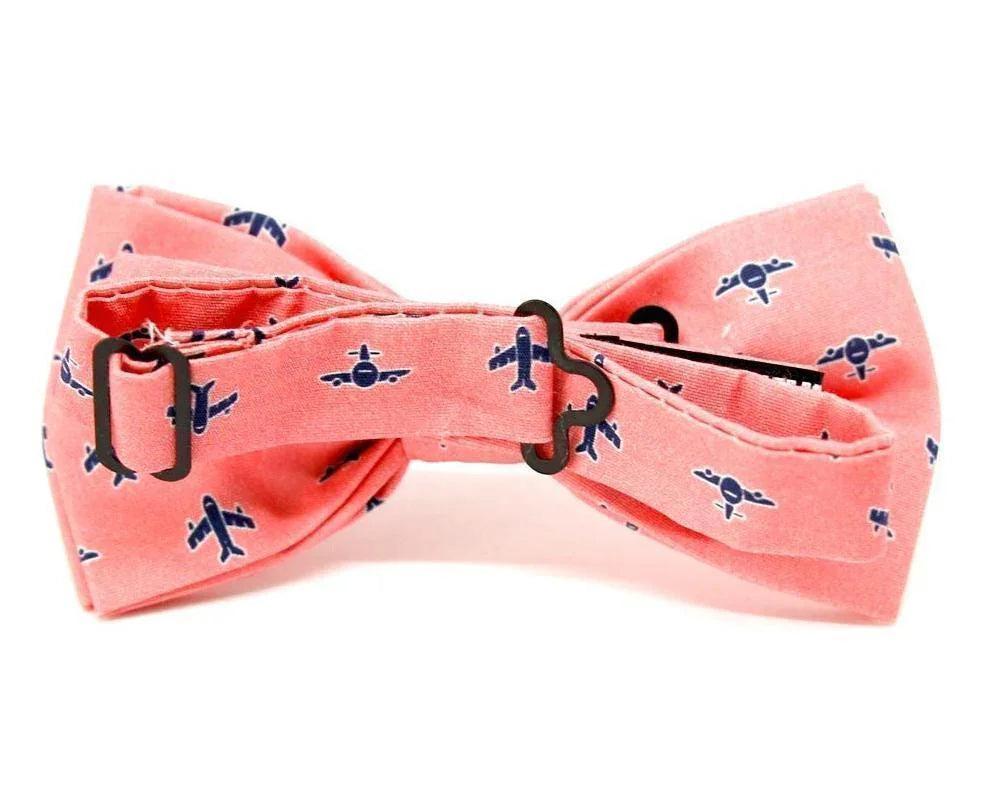 Pajarita rosa con estampado de aviones en azul, complemento original y hecho a mano para hombre y niño