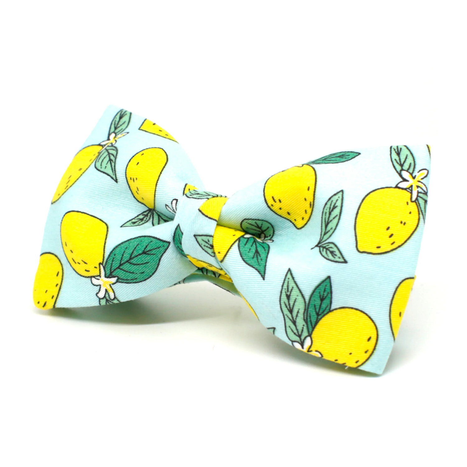 Pajarita de tela azul con diseño de limones amarillos y hojas verdes, estilo original y fresco